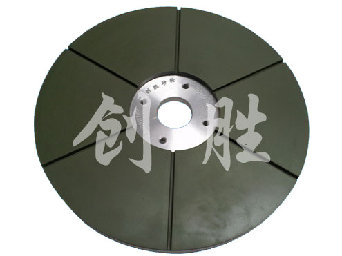 Grooved resin grinding disc