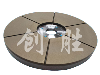 Slotted bronze grinding disc