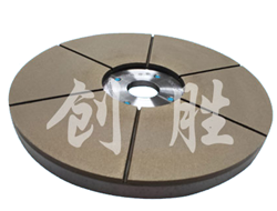 Slotted bronze grinding disc